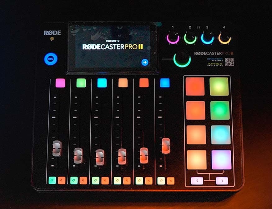 A birds-eye shot of a switched on and lit up RODECaster Pro II.