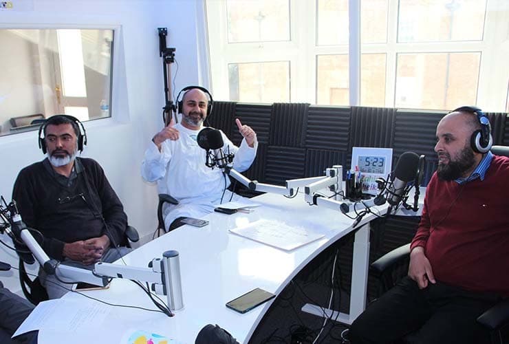 Ramadan FM presenters in the studio.