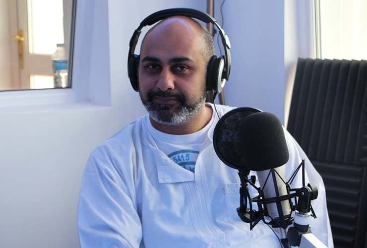 Ramadan FM presenter in the studio.